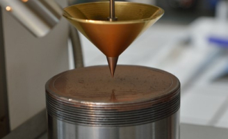 Test de consistance d'une graisse lubrifiante